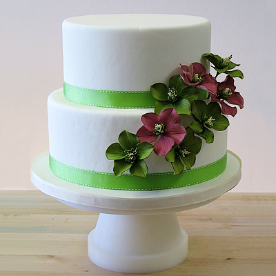 A simple 2tiered round Wedding Cake You can choose the color of ribbon and